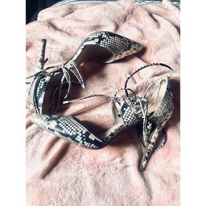 Snakeskin print lace up heels